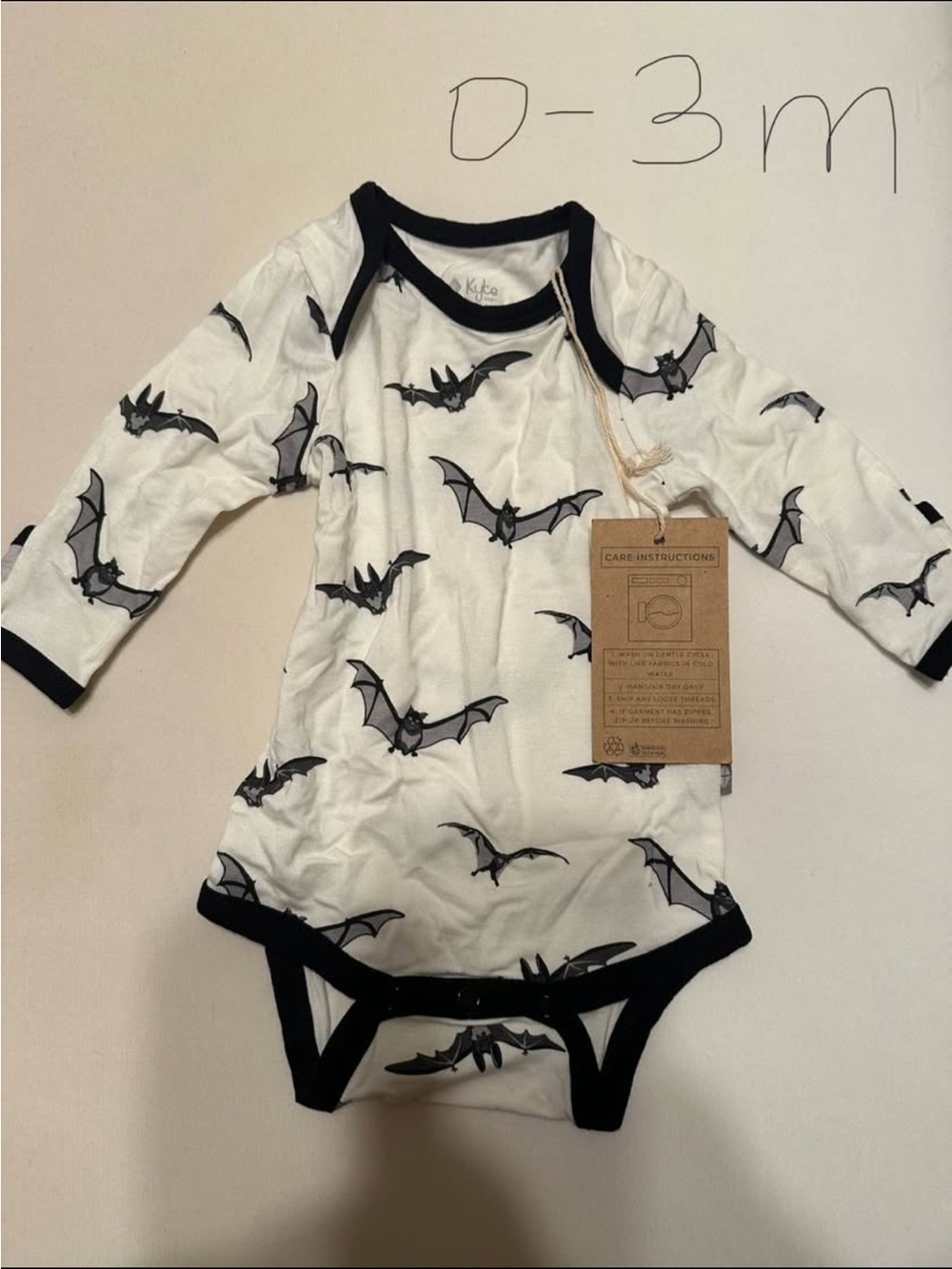 Kyte BABY White One-Piece with Black Bat Print